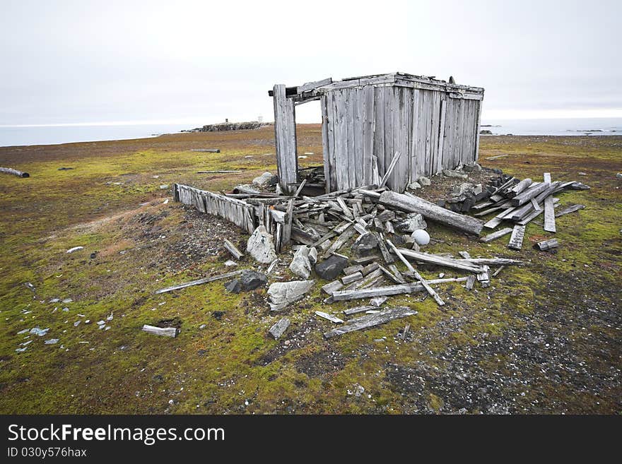 Old, abnandoned, wooden hut on tundra - Arctic, Spitsbergen. Old, abnandoned, wooden hut on tundra - Arctic, Spitsbergen