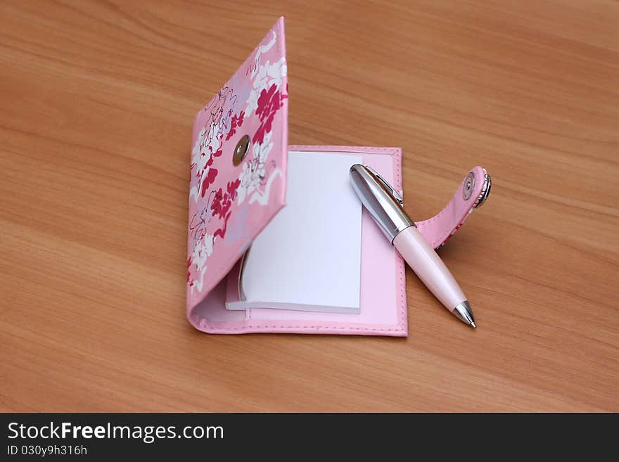 Lie on a wooden table, office supplies