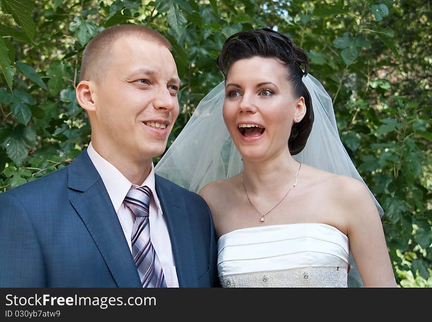 The bride's face expressed surprise delight. The bride's face expressed surprise delight.