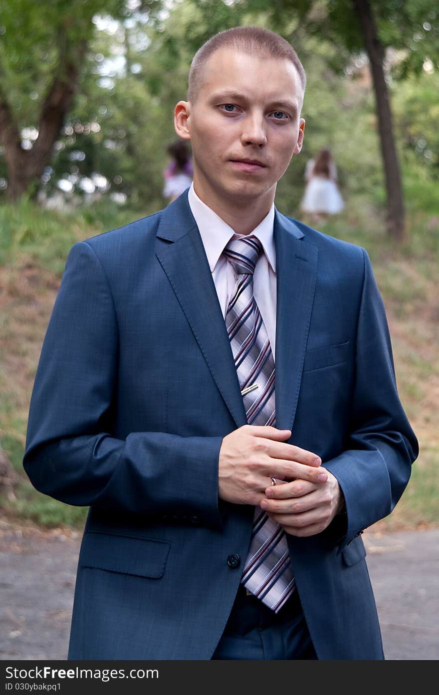 Man dressed with a wedding ring on his finger. Man dressed with a wedding ring on his finger.