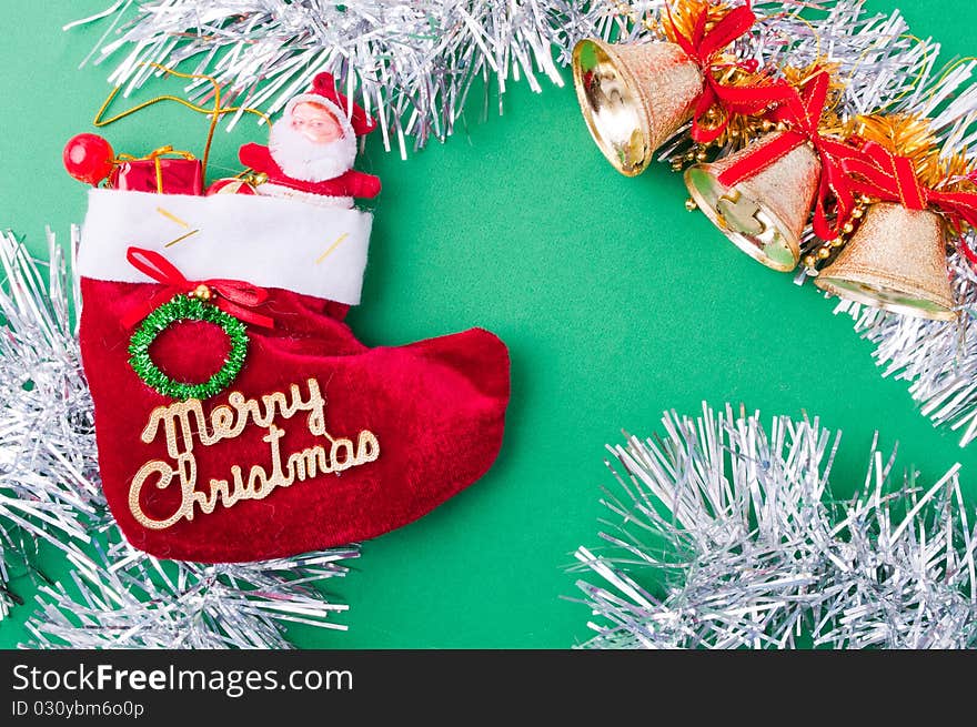 Christmas decoration objects on light green background. Christmas decoration objects on light green background