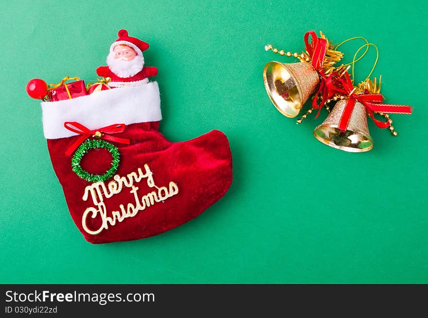 Christmas decoration objects on light green background. Christmas decoration objects on light green background