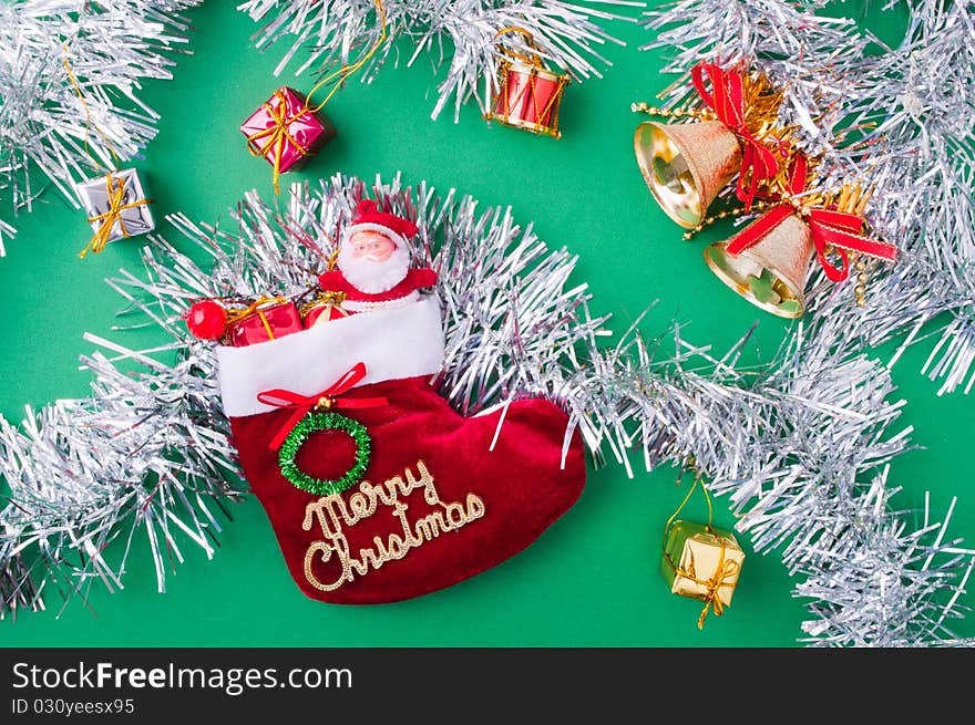 Christmas decoration objects on light green background. Christmas decoration objects on light green background