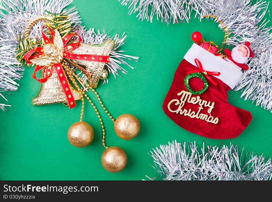 Christmas decoration objects on light green background. Christmas decoration objects on light green background