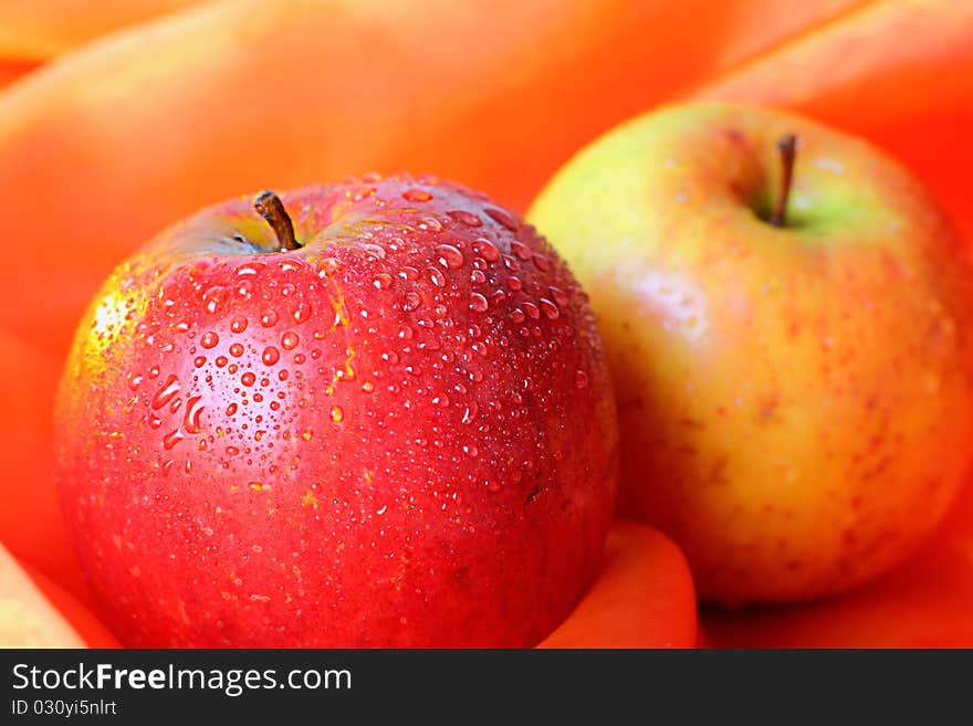 Fresh apple with water drops