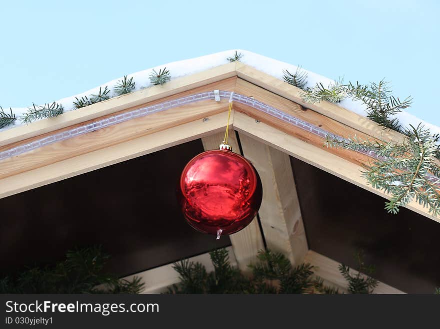 Red Bauble on Christmas Tree with Reflection. Red Bauble on Christmas Tree with Reflection