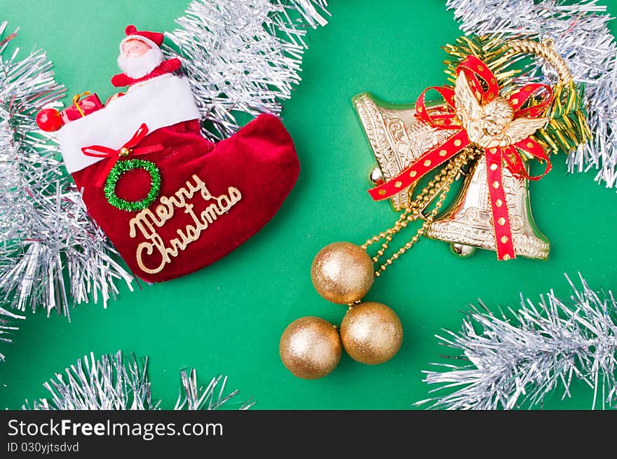 Christmas decoration objects on light green background. Christmas decoration objects on light green background