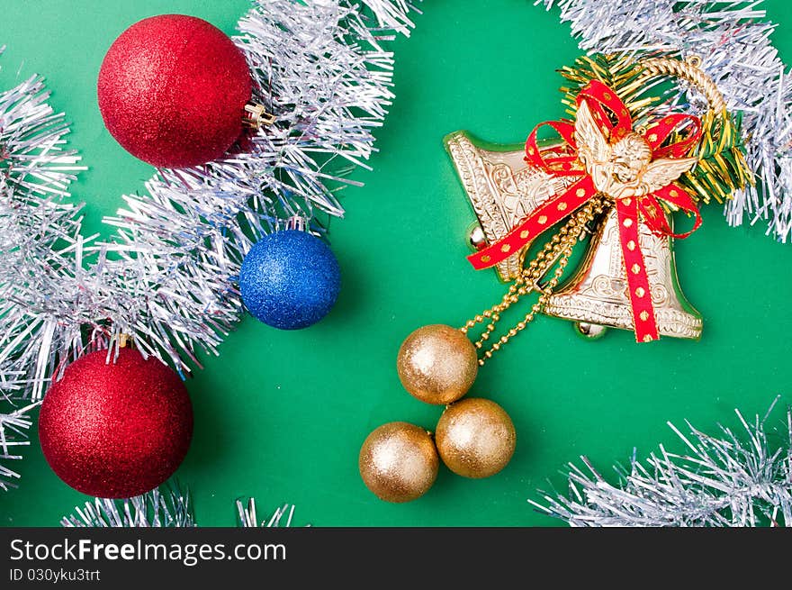 Christmas decoration objects on light green background. Christmas decoration objects on light green background