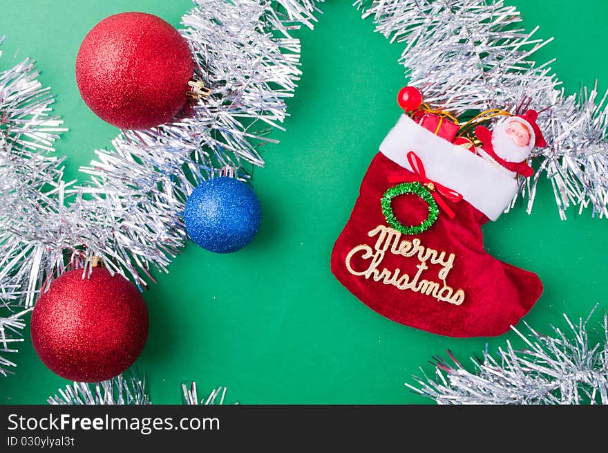 Christmas decoration objects on light green background. Christmas decoration objects on light green background