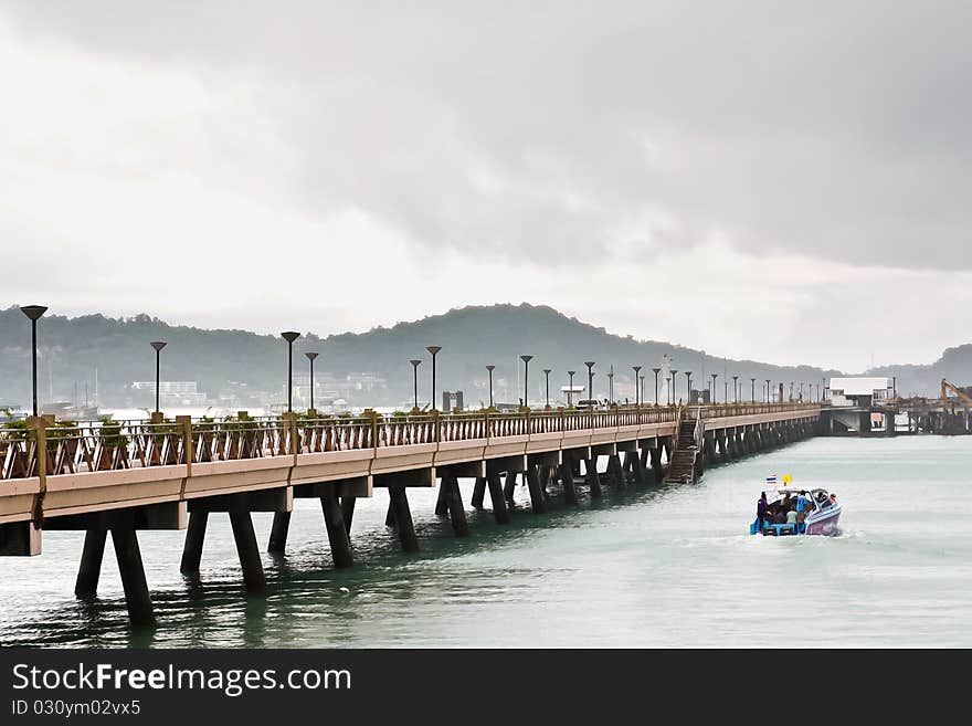 Single boat in lake in phuket and bridge. Single boat in lake in phuket and bridge