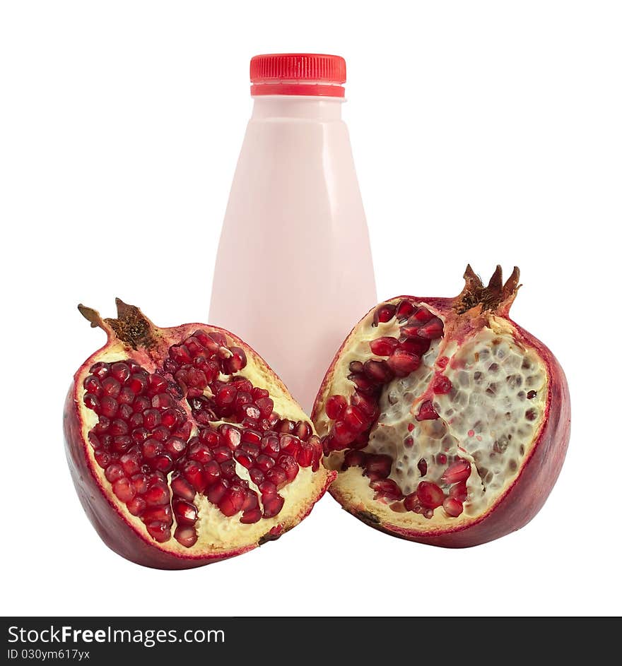 Bottle of yogurt and pomegranate on a white background