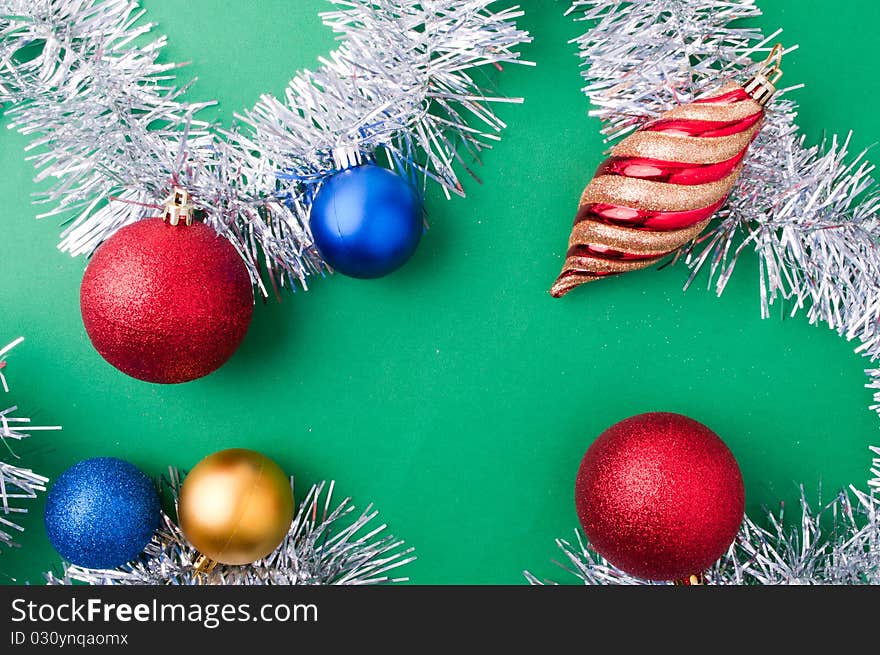 Christmas decoration objects on light green background. Christmas decoration objects on light green background