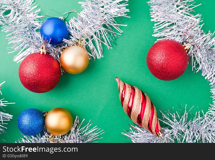 Christmas decoration objects on light green background. Christmas decoration objects on light green background