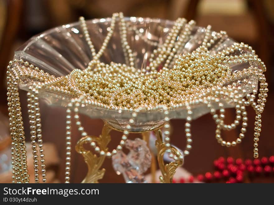 Vase with golden beads