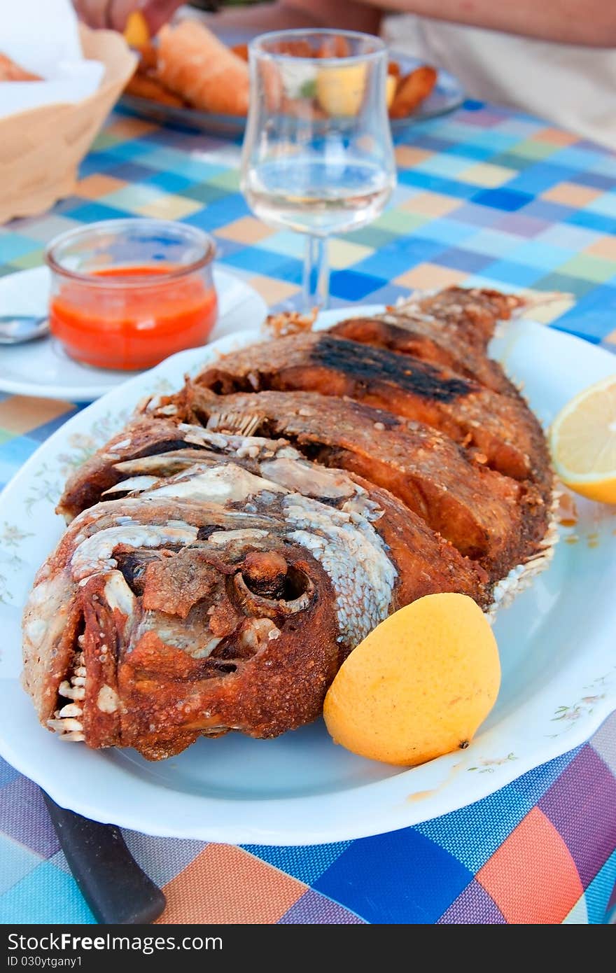 Still life with grilled fish. Still life with grilled fish.