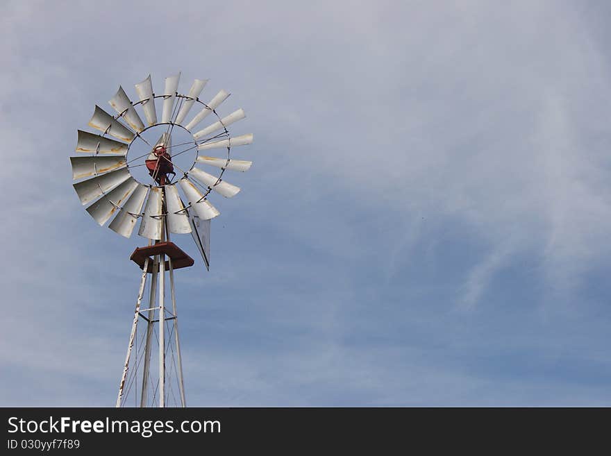 Windmill typically found on American farms in the 19th and 20th century. Windmill typically found on American farms in the 19th and 20th century