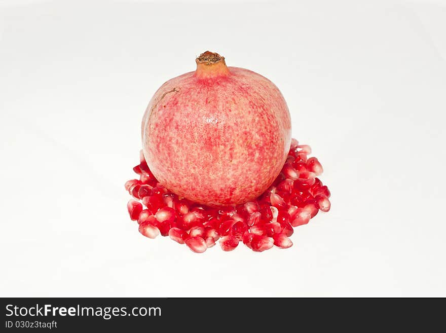 Tropical fruit pomegranate on white background