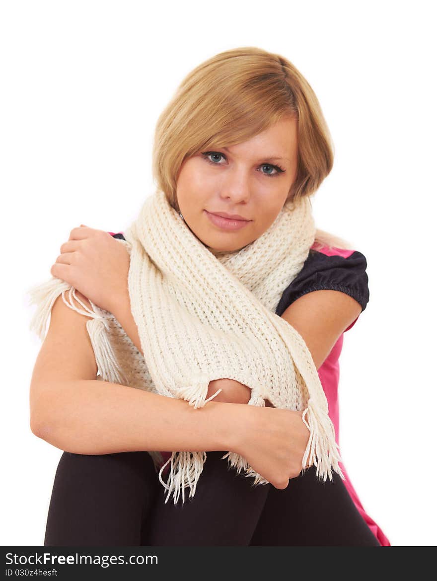 Girl Sitting At Home Wrapped In A Warm Scarf