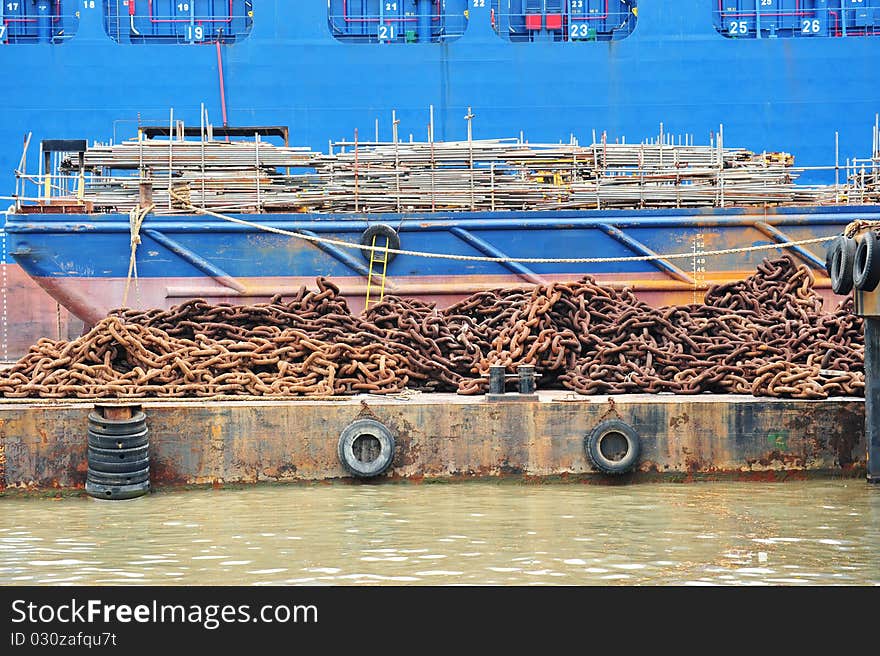 Barge Laden With Heavy Metal Chain At A Repair Yard