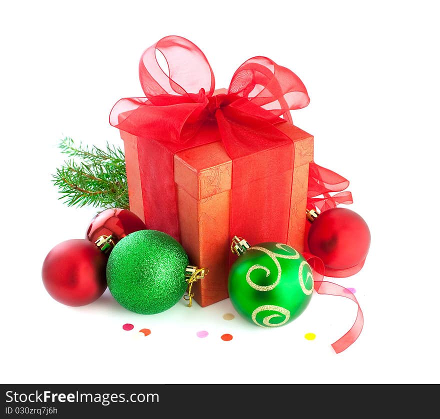 Christmas gifts, with red and green balls. Isolated on white