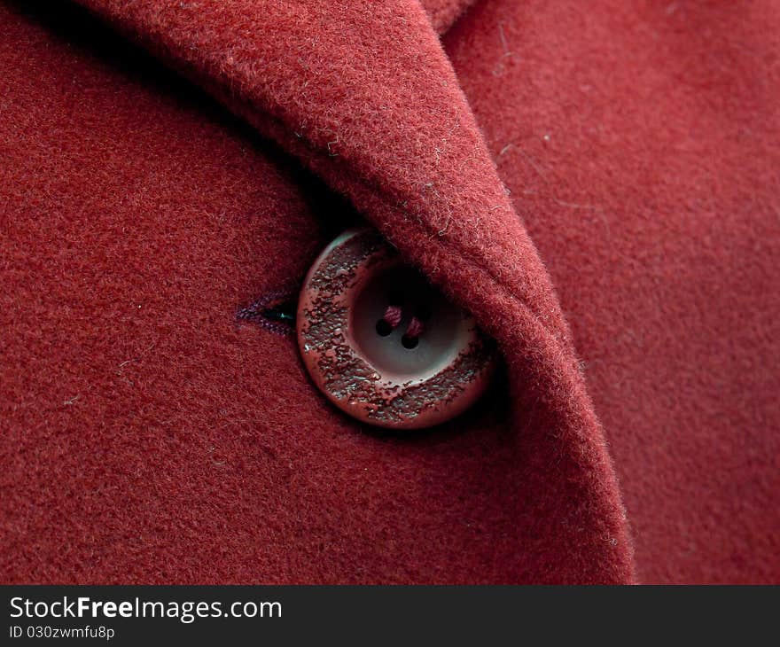 Red button on  coat