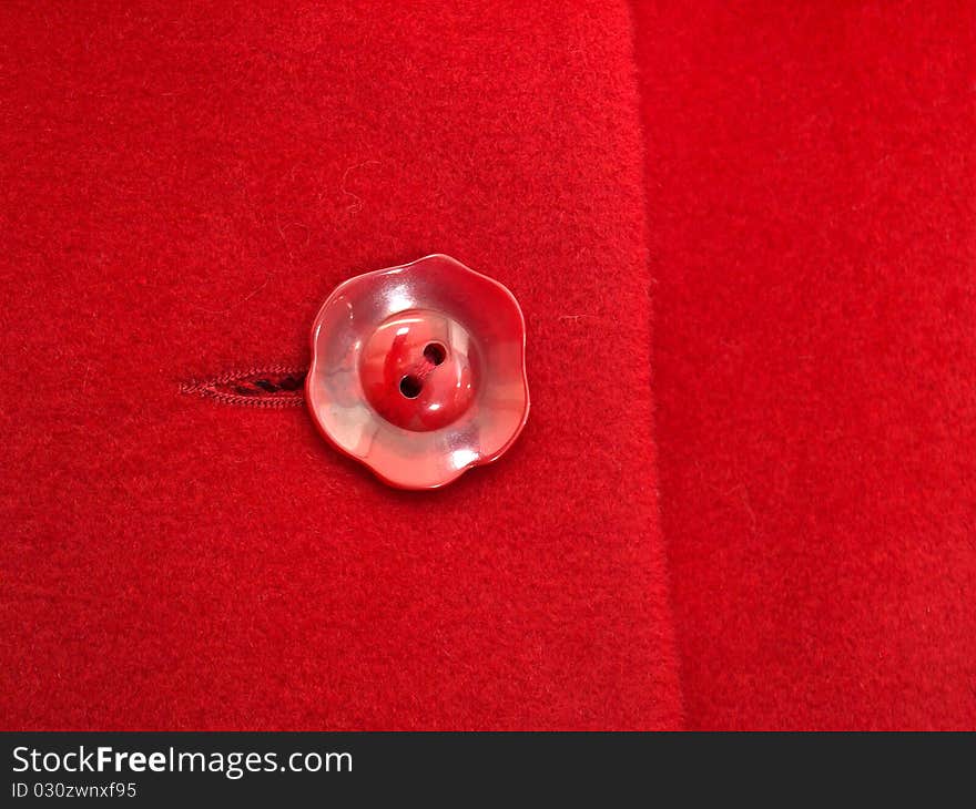 Red button on  coat