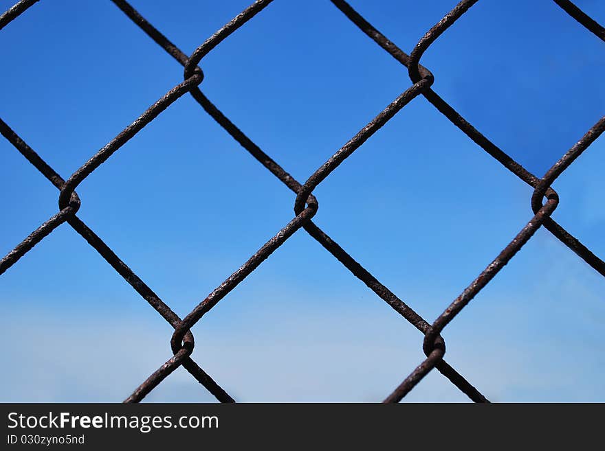 Rusty iron fence close up. Rusty iron fence close up.