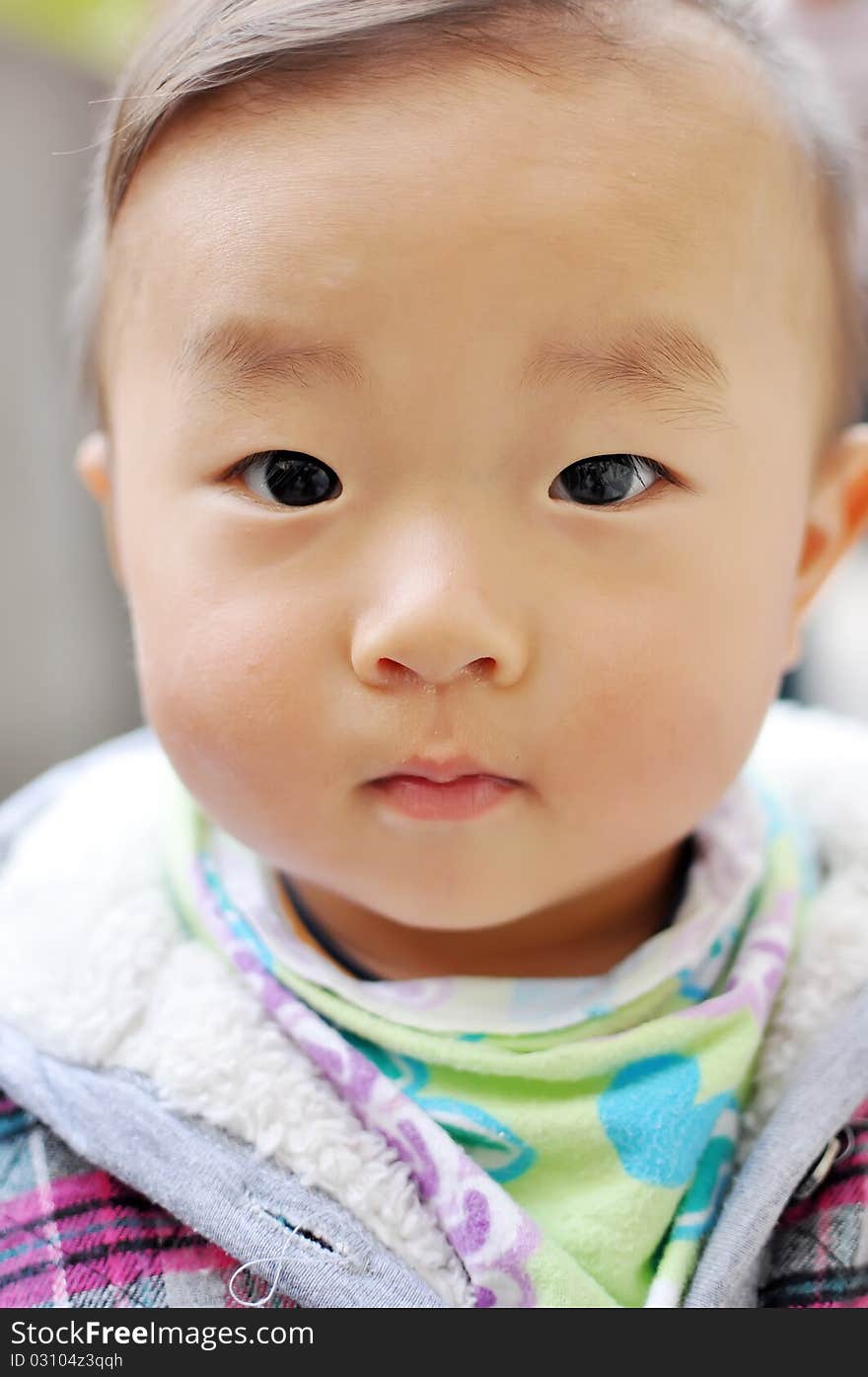 A Chinese baby looking at camera，which taken on November 21st，2010