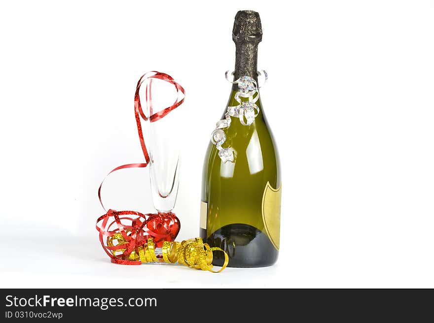 Bottle of champagne and flute  glass decorated with ribbons for christmas celebration. Bottle of champagne and flute  glass decorated with ribbons for christmas celebration