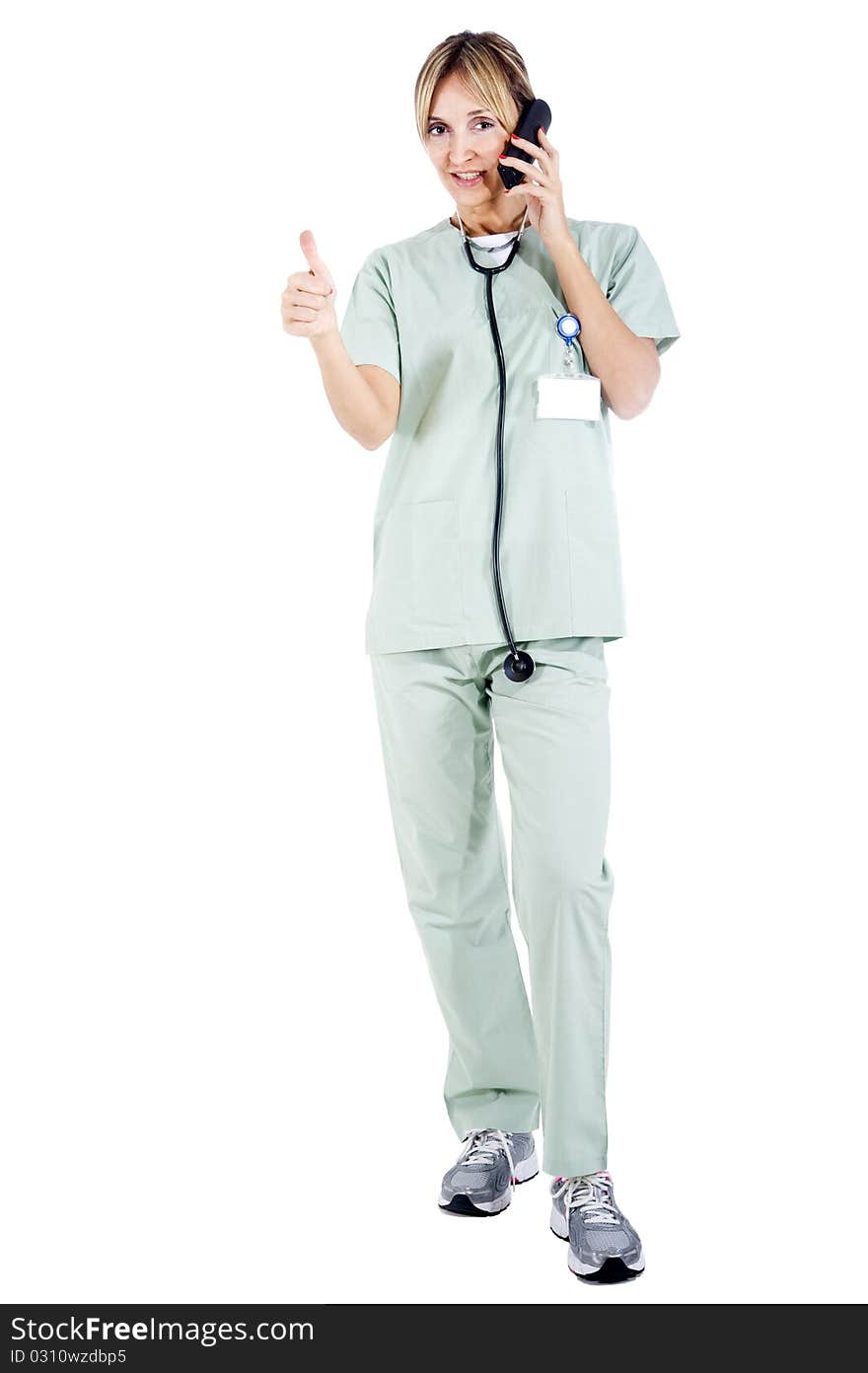 Smiling confident medical staff on the phone with a patient about test results. Smiling confident medical staff on the phone with a patient about test results