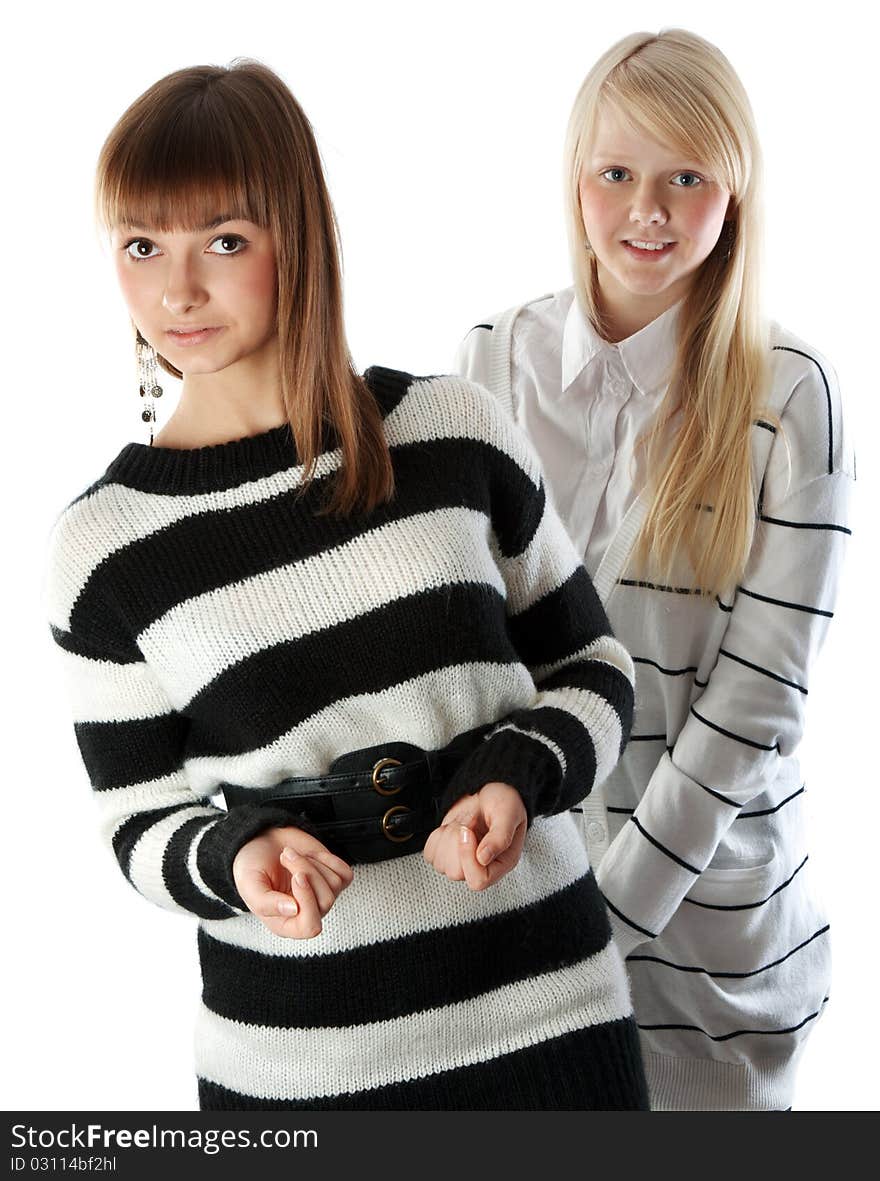 Portrait two girls of the blonde and brunettes insulated on white background