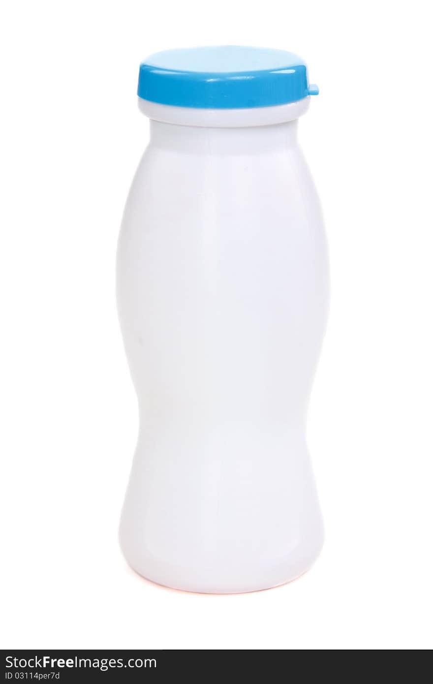 Plastic bottle with blue lid on white background