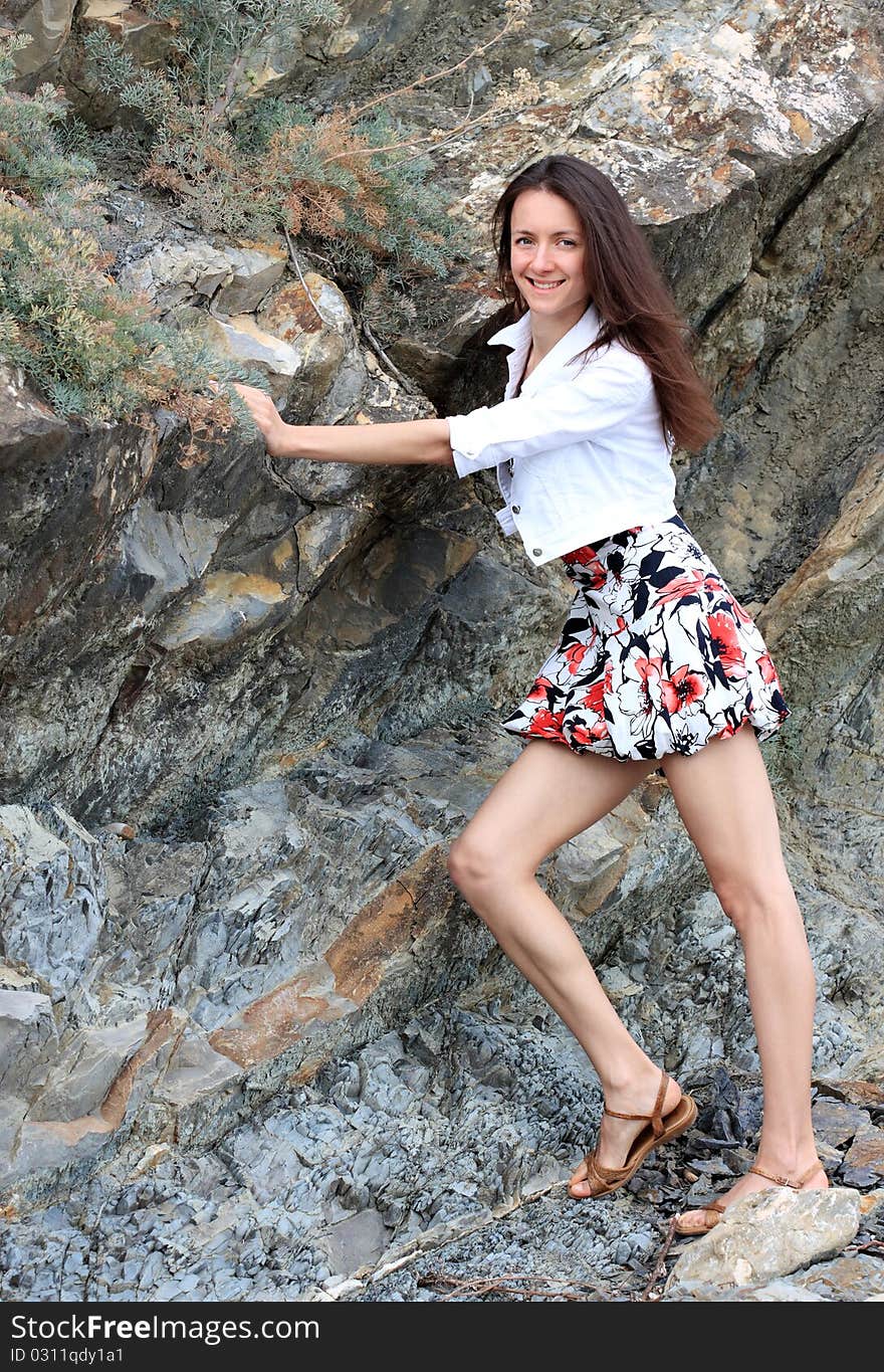 Happy young woman enjoying summer vacation