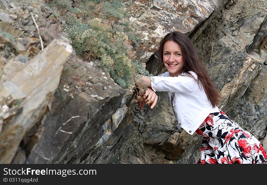 Happy young woman enjoying summer vacation