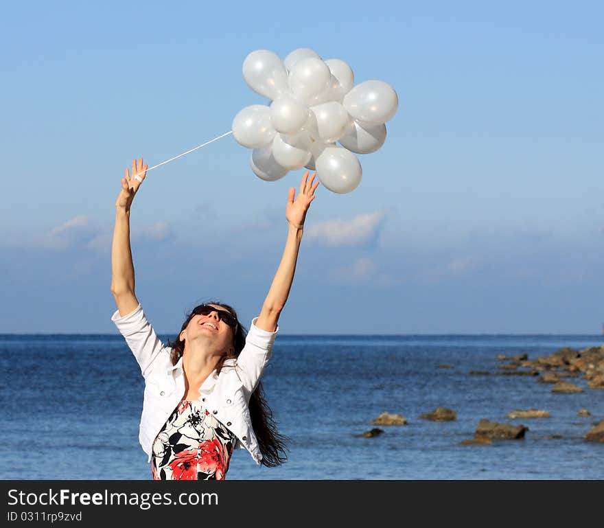 Happy young woman enjoying summer vacation