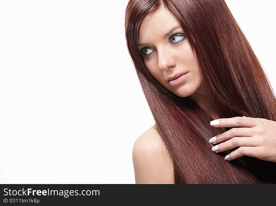 Attractive young girl with beautiful hair on a white background. Attractive young girl with beautiful hair on a white background