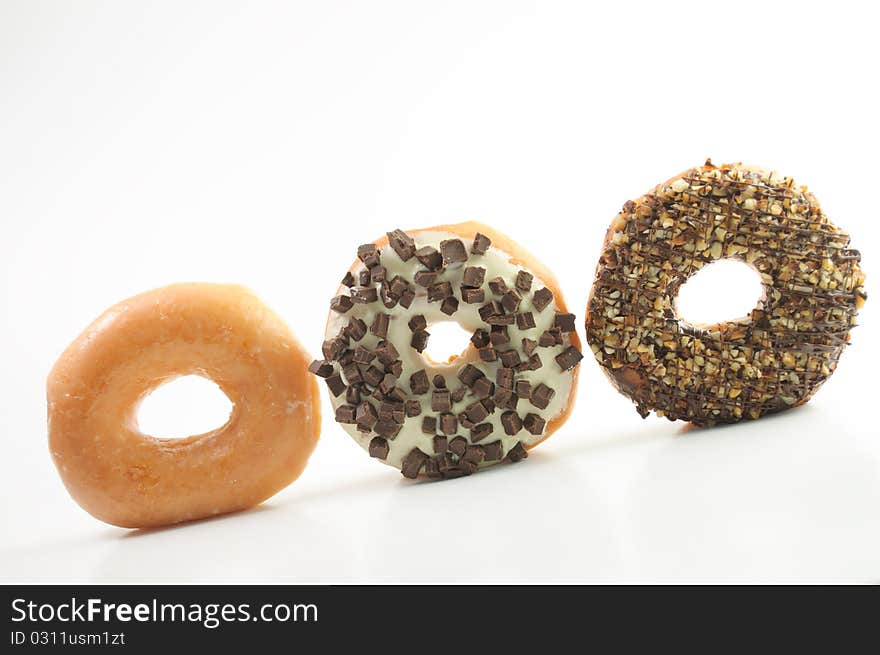 Assorted Donuts On A White Background