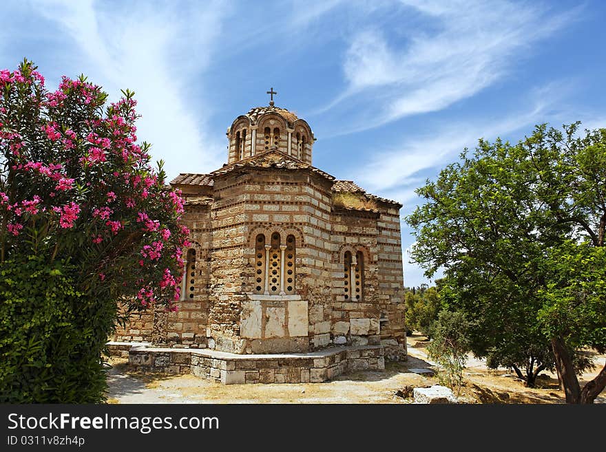 Little chapel in Athens and clouds