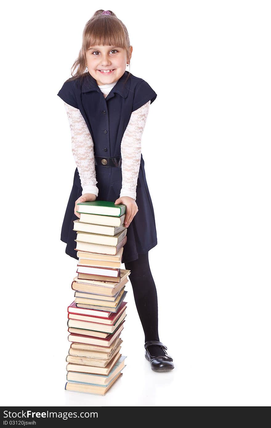 Schoolgirl witn books. Isolated on white background