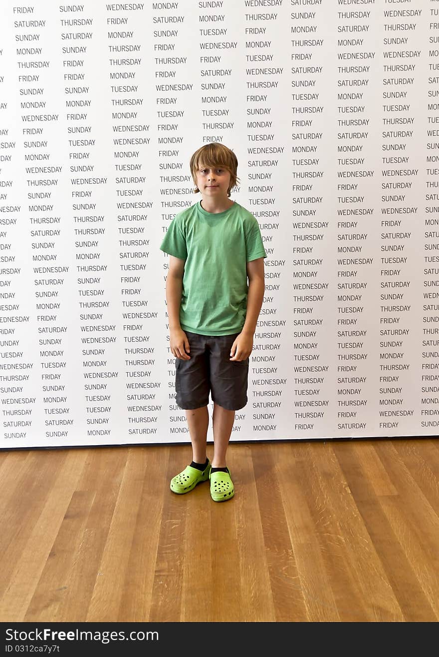 Portrait of a cute boy in the museum