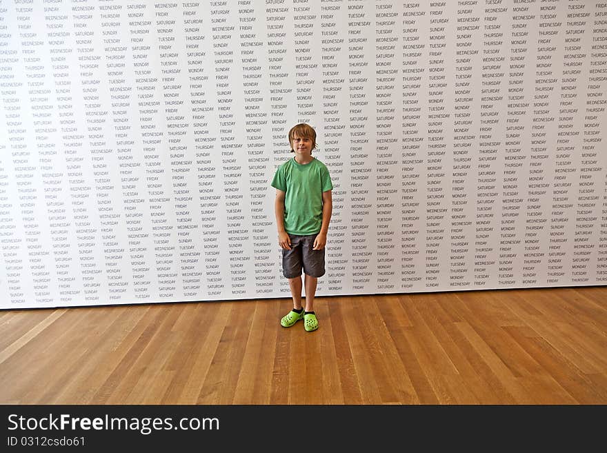 Portrait of a cute boy in the museum