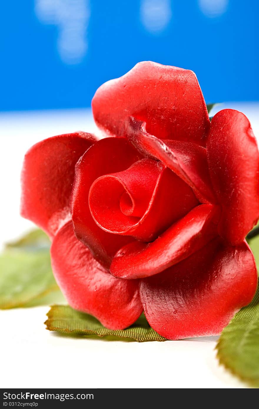 Red artificial glass rose