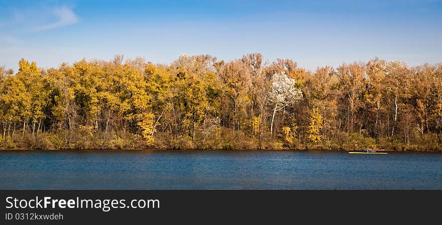 Autumnal landscape- forest under the river. Autumnal landscape- forest under the river