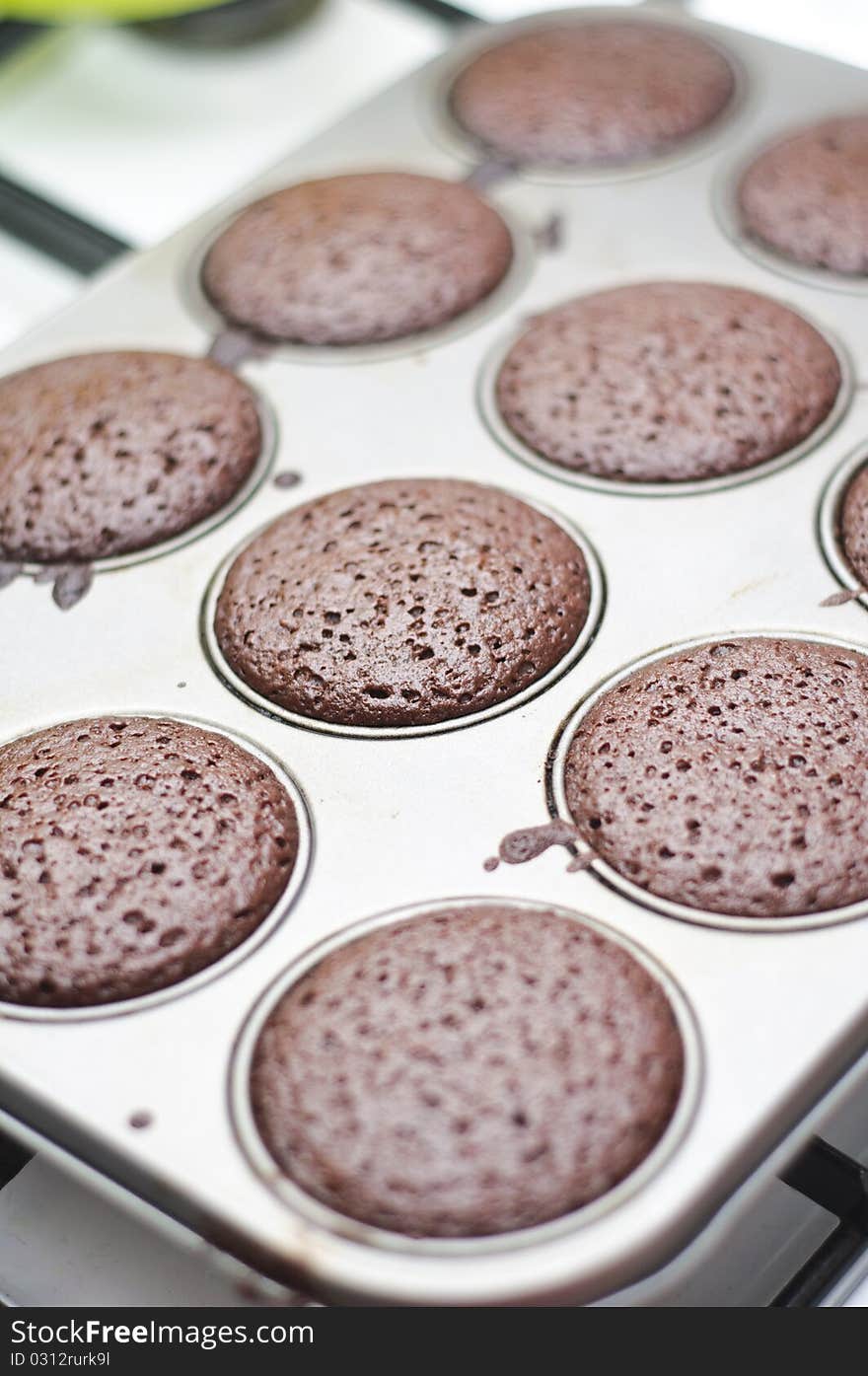 Baked chocolate muffins in muffin pan