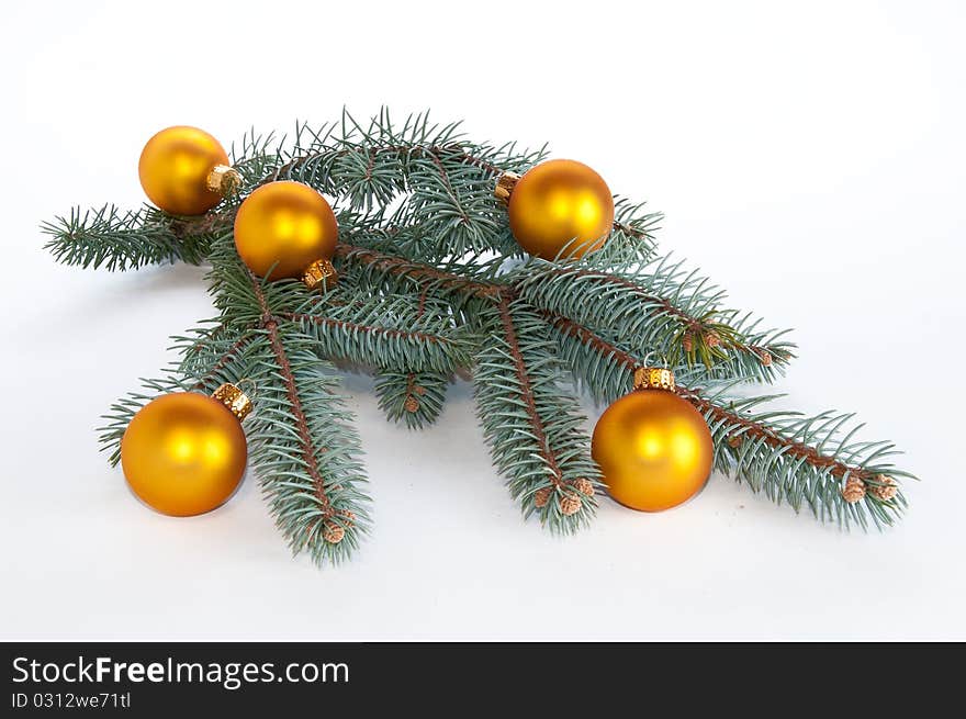 Single branch of pine with ornaments