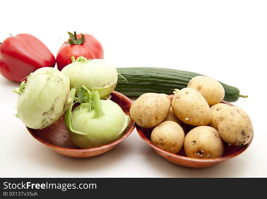 Kohlrabi with potato in the wood bowl. Kohlrabi with potato in the wood bowl