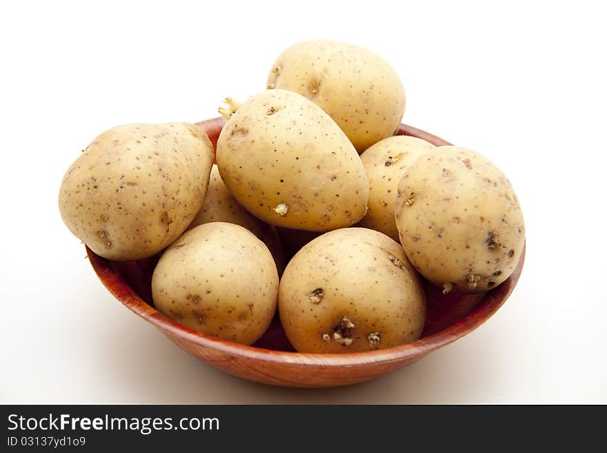 Potato in the wood bowl