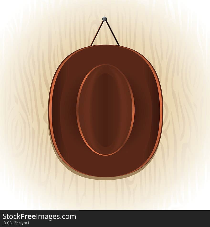 Vector cowboy hat on the wood background.