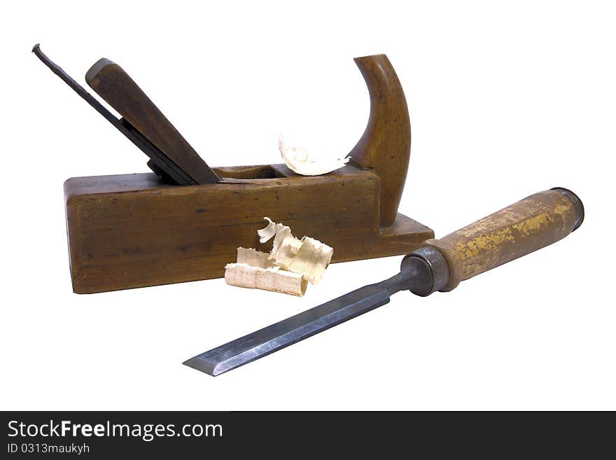 Old wooden plane and chisel on a white background. Old wooden plane and chisel on a white background