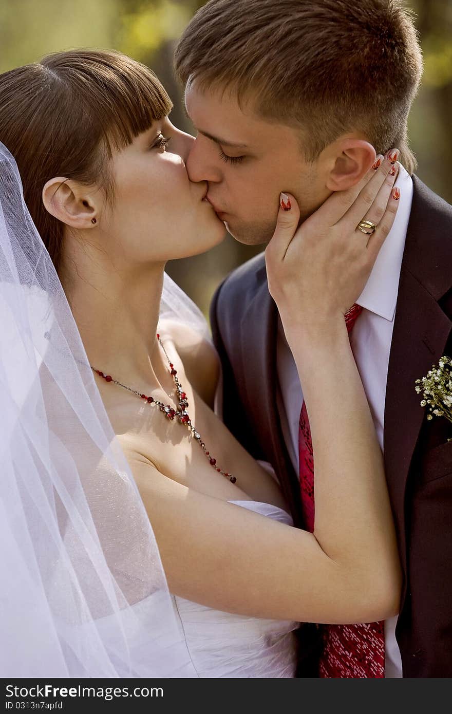 Bride and groom kissing